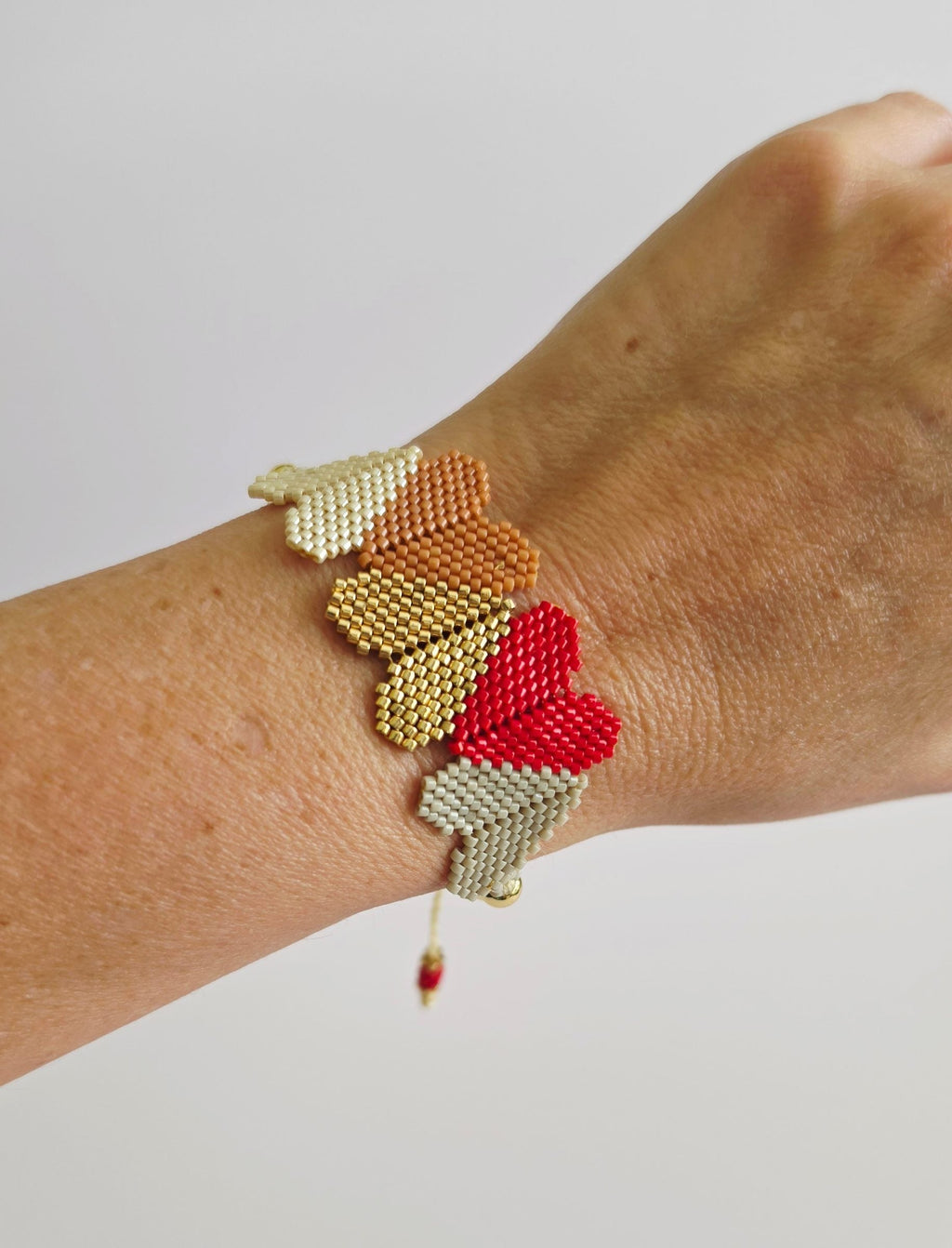 Five Amours Bracelet, worn on model – handwoven Miyuki jewelry by Franchesca Jewels
