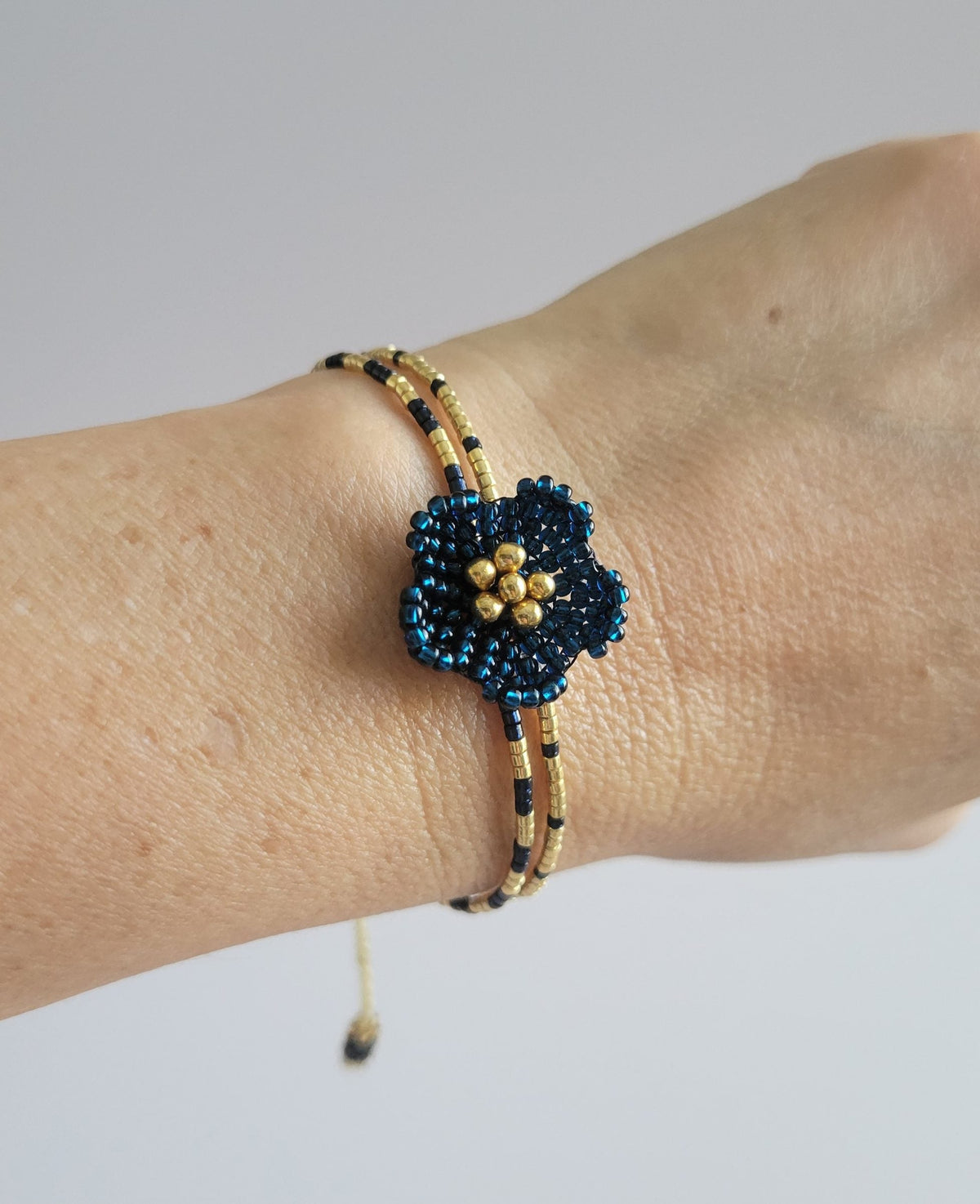 Little Bloom Bracelet in Blue Montana, worn on model – handwoven Miyuki jewelry by Franchesca Jewels