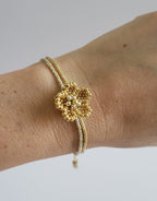 Little Bloom Bracelet in Golden Glow, worn on model – handwoven Miyuki jewelry by Franchesca Jewels