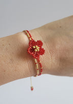 Little Bloom Bracelet in Ruby Red, worn on model – handwoven Miyuki jewelry by Franchesca Jewels
