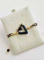 The Love Knot Bracelet in Blue Montana, handwoven with Miyuki beads by Franchesca Jewels