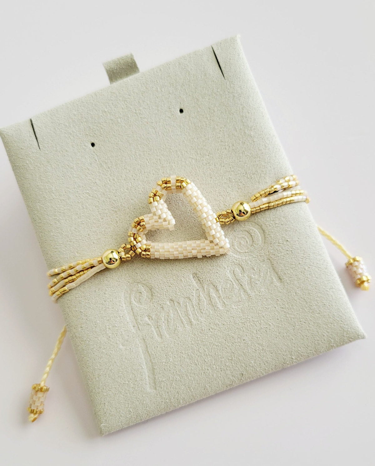 The Love Knot Bracelet in Ivory Pearl, handwoven with Miyuki beads by Franchesca Jewels
