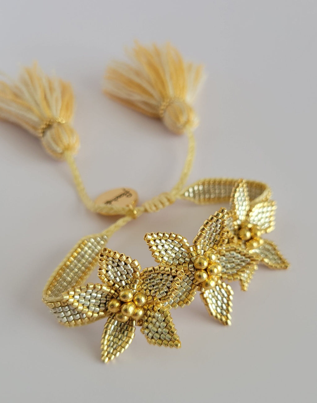 Three Flowers With Tassels Bracelet – Silver with golden | Handmade jewelry by Franchesca Jewels